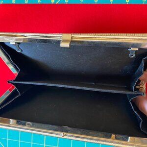 silver lame clutch bag